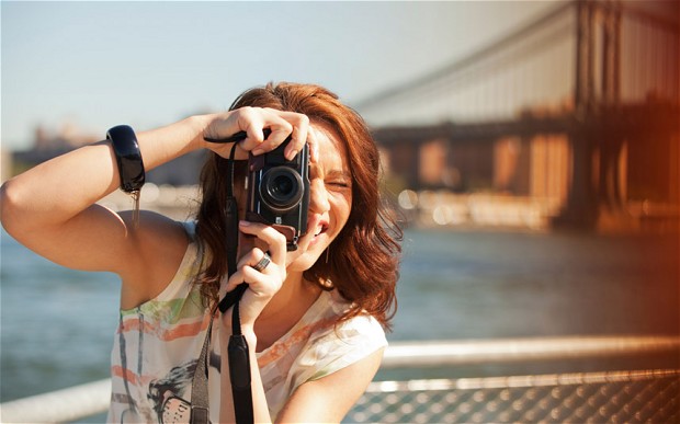 Country taking teen photo